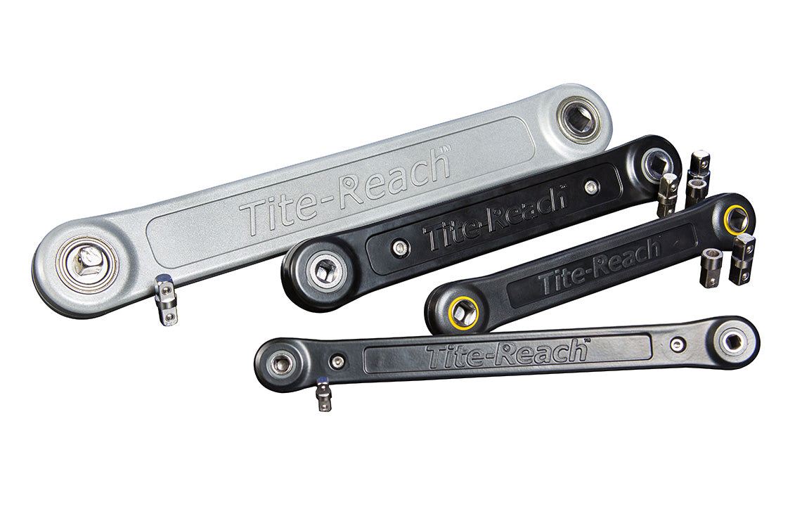 Four Tite-Reach brand wrench extension tools, varying in size and color (one silver, three black), are arranged diagonally.